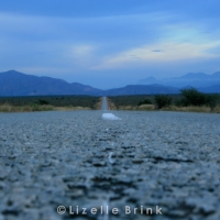 Tar road and mountains