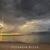 Storm clouds and sunrise over Lake Malawi